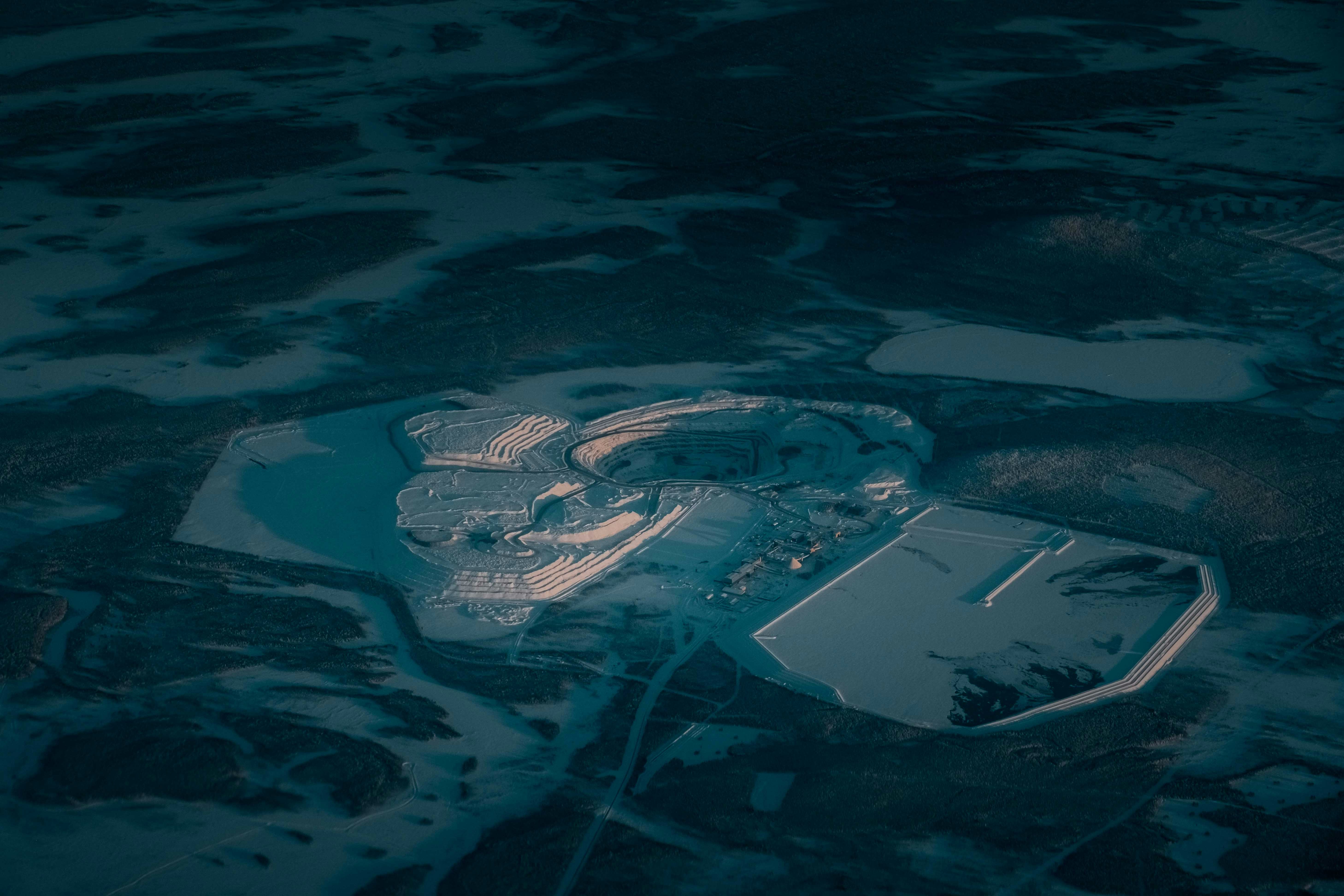 aerial view of green and white field